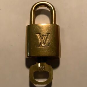 Vintage Louis Vuitton Brass ‘320’ in Goldtone with Goldtone Key